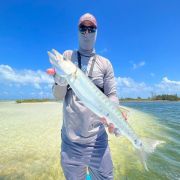 Happy angler with bonefish catch