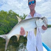 Happy Angler with baby tarpoon catch