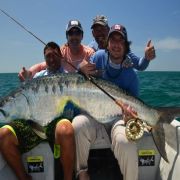 Happy anglers with a great tarpoon catch