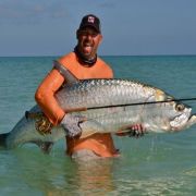 Amazin catch of a gigantic tarpoon by a happy angler
