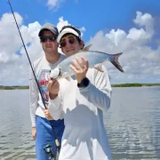 Happy Angler with baby tarpoon catch