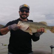 Angler with amazing catch of a great black bass catch at lake Chapala