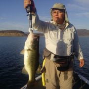 Angler with black bass catch