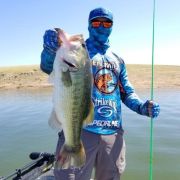 Angler and his great bass catch at Mateos Lake