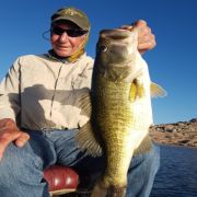 Angler with black bass catch at Mateos Lake