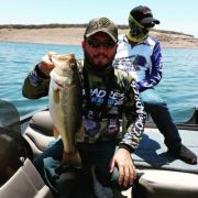 a beautiful black bass catch and its happy angler at Lake Mahone