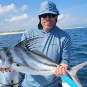 Angler showing off amazing roosterfish catch