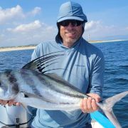 Angler showing off amazing roosterfish catch