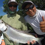 Angler fly fishing for tarpon
