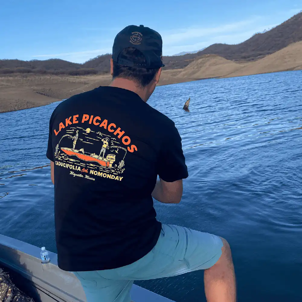 Fishing with blue shirt back logo
