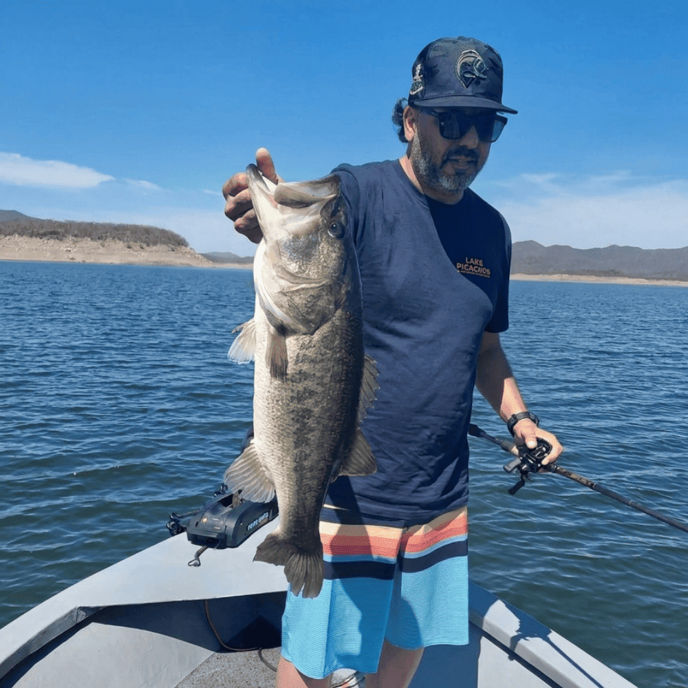 Fishing with blue shirt front logo